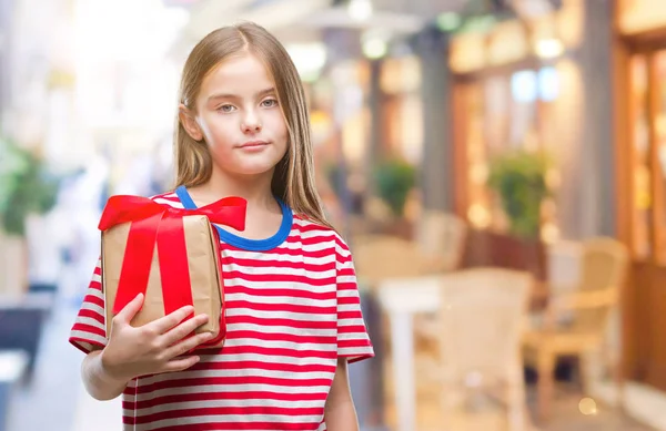 Young Beautiful Girl Giving Christmas Valentine Gift Isolated Background Confident — Stock Photo, Image
