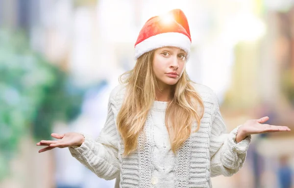 Jonge Mooie Blonde Vrouw Met Kerst Hoed Geïsoleerde Achtergrond Clueless — Stockfoto
