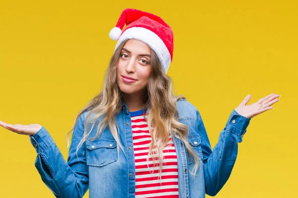 Mooie Jonge Blonde Vrouw Kerstmuts Dragen Geïsoleerde Achtergrond Clueless Verward — Stockfoto