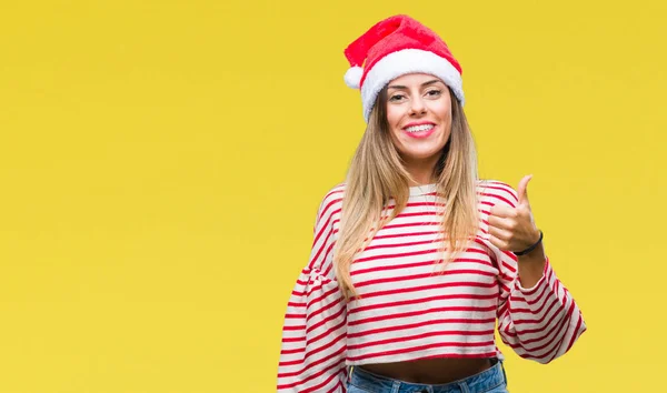 Mooie Jongedame Kerstmuts Dragen Geïsoleerde Achtergrond Gelukkig Duimschroef Opwaarts Gebaar — Stockfoto