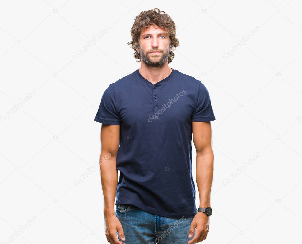 Handsome hispanic model man over isolated background with serious expression on face. Simple and natural looking at the camera.