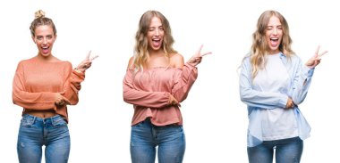 Rahat giyen genç güzel genç kadın mutlu yüz zafer işareti yaparken kameraya göz kırpıyor ile gülümseyen beyaz izole arka plan bakın. İki numaralı.