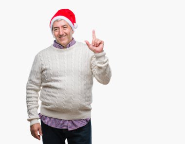 Yakışıklı komuta sizde başarılı fikirle izole arka plan işaret parmağı üzerinde Noel şapka takıyor. Çıktıktan ve mutlu. Bir numara.