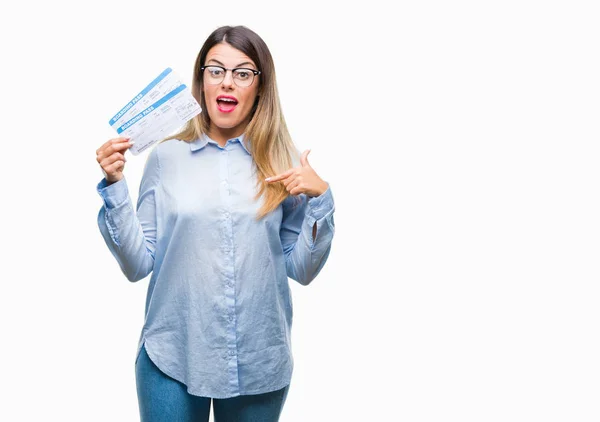 Young Beautiful Woman Holding Boarding Pass Isolated Background Surprise Face — Stock Photo, Image