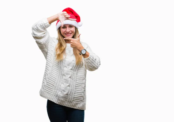 얼굴로 손가락과 손으로 만드는 프레임 크리스마스 모자를 창의력과 — 스톡 사진