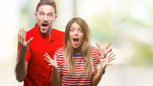 Pareja Joven Enamorada Sobre Fondo Aislado Celebrando Loco Sorprendido Por — Foto de Stock