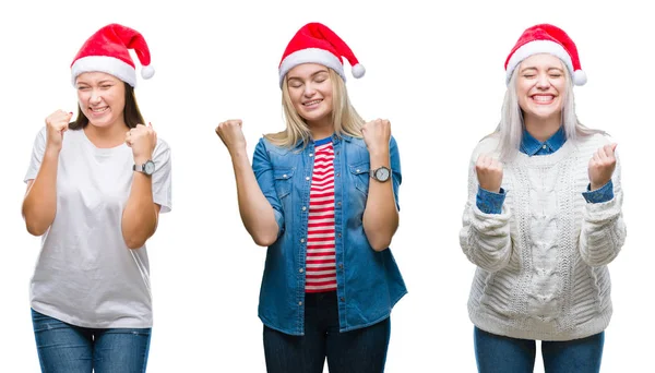 一群年轻妇女在孤立的背景下戴着圣诞帽 非常高兴和兴奋地做了胜利的手势 举起双臂 微笑着尖叫着要成功 庆祝理念 — 图库照片