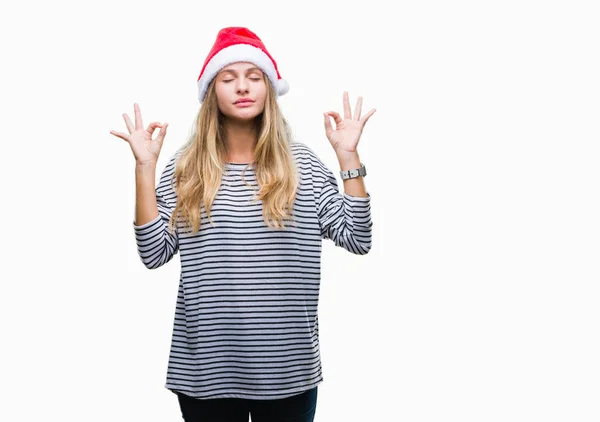 Όμορφη Ξανθιά Κοπέλα Φορώντας Καπέλο Χριστουγέννων Πέρα Από Απομονωμένο Υπόβαθρο — Φωτογραφία Αρχείου