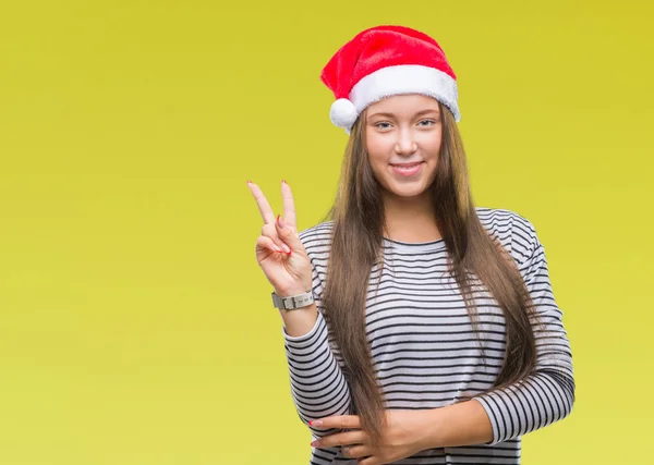 Unga Vackra Kaukasiska Kvinna Bär Jul Hatt Över Isolerade Bakgrund — Stockfoto