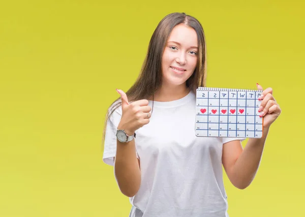 Mulher Branca Jovem Segurando Calendário Menstruação Sobre Fundo Isolado Feliz — Fotografia de Stock