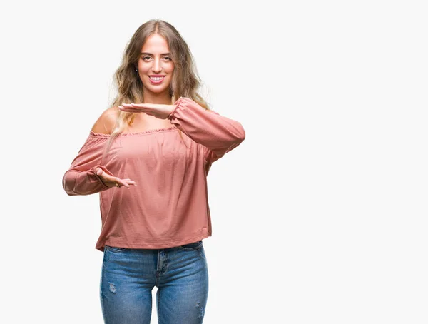 Beautiful Young Blonde Woman Isolated Background Gesturing Hands Showing Big — Stock Photo, Image