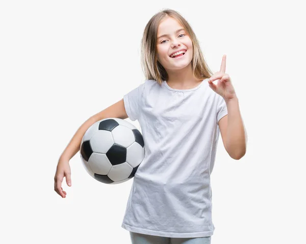 Jovem Menina Bonita Segurando Bola Futebol Sobre Fundo Isolado Surpreendido — Fotografia de Stock
