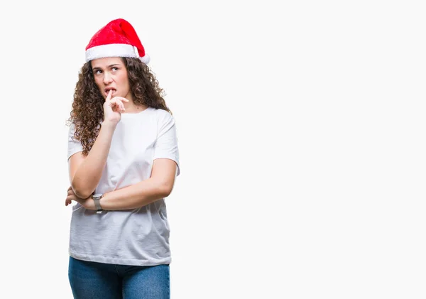 Chica Morena Joven Con Sombrero Navidad Sobre Fondo Aislado Mirando — Foto de Stock