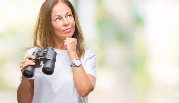 Middle Age Hispanic Woman Looking Binoculars Isolated Background Serious Face — Stock Photo, Image