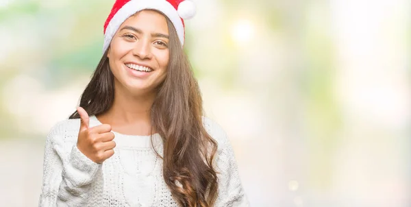 Giovane Donna Araba Indossa Cappello Natale Sfondo Isolato Facendo Pollici — Foto Stock