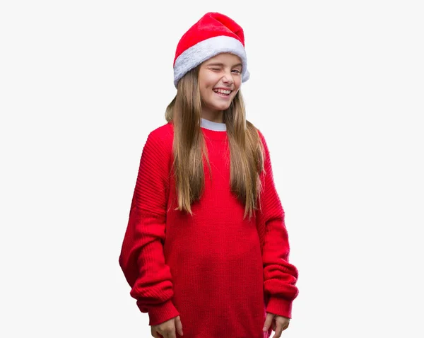 Young Beautiful Girl Wearing Christmas Hat Isolated Background Winking Looking — Stock Photo, Image