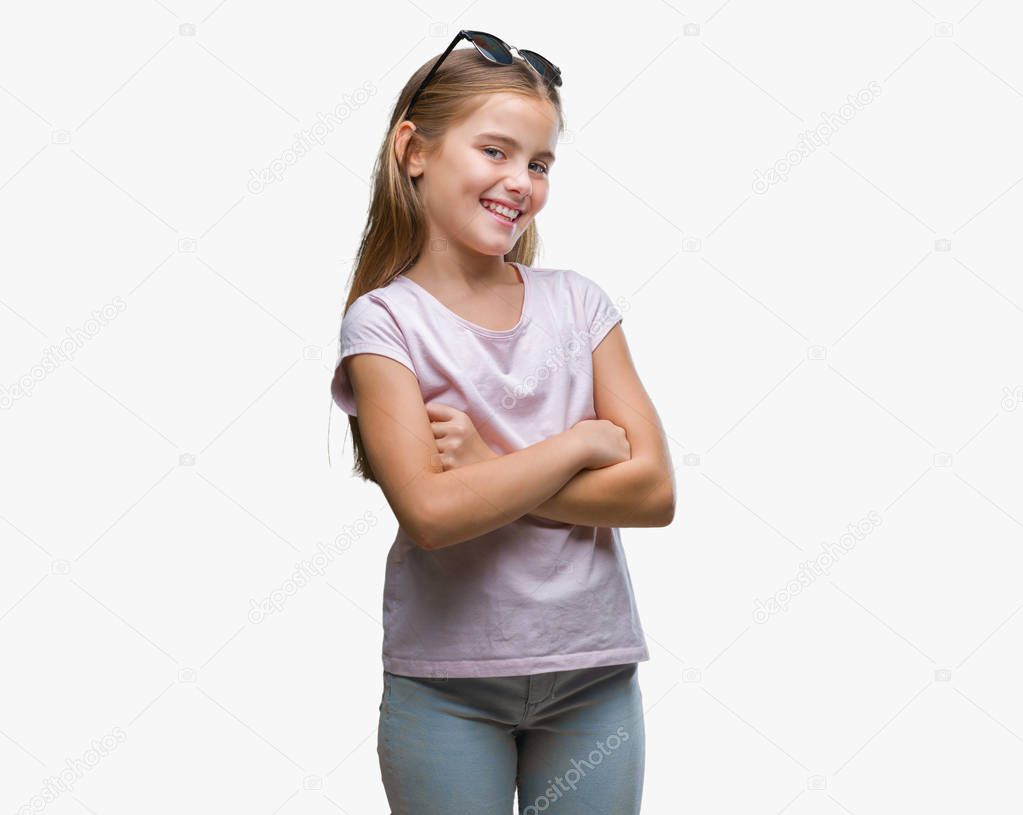 Young beautiful girl wearing sunglasses over isolated background happy face smiling with crossed arms looking at the camera. Positive person.