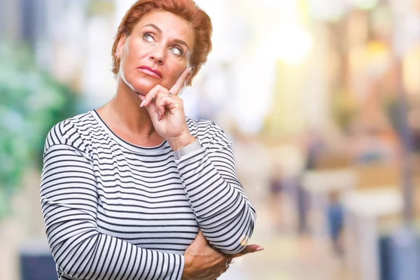 Atrractive Senior Caucasian Redhead Woman Isolated Background Hand Chin Thinking — стоковое фото