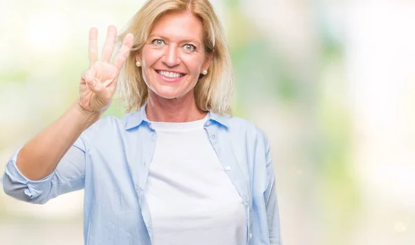 Блондинка Середнього Віку Над Ізольованим Фоном Показуючи Вказуючи Пальцями Номер — стокове фото
