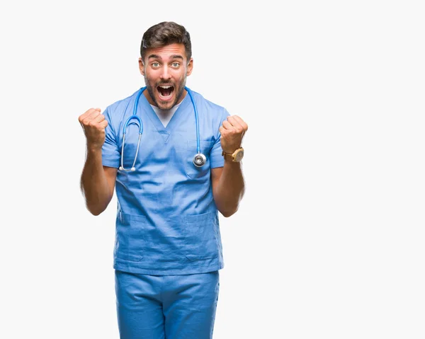 Νέος Ωραίος Γιατρός Νοσοκόμα Άνδρα Πάνω Μια Απομονωμένη Φόντο Γιορτάζει — Φωτογραφία Αρχείου