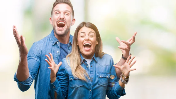 Pareja Joven Enamorada Sobre Fondo Aislado Celebrando Locos Locos Por — Foto de Stock