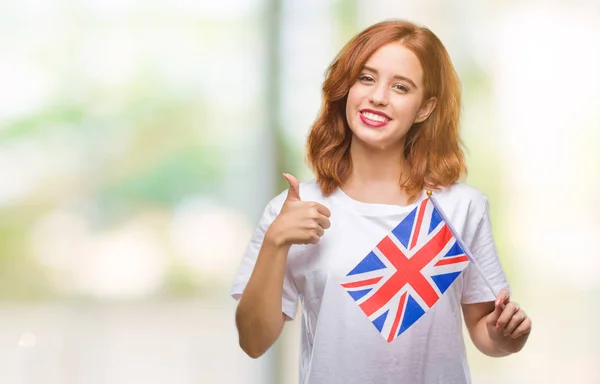 Joven Hermosa Mujer Sosteniendo Bandera Del Reino Unido Sobre Fondo —  Fotos de Stock