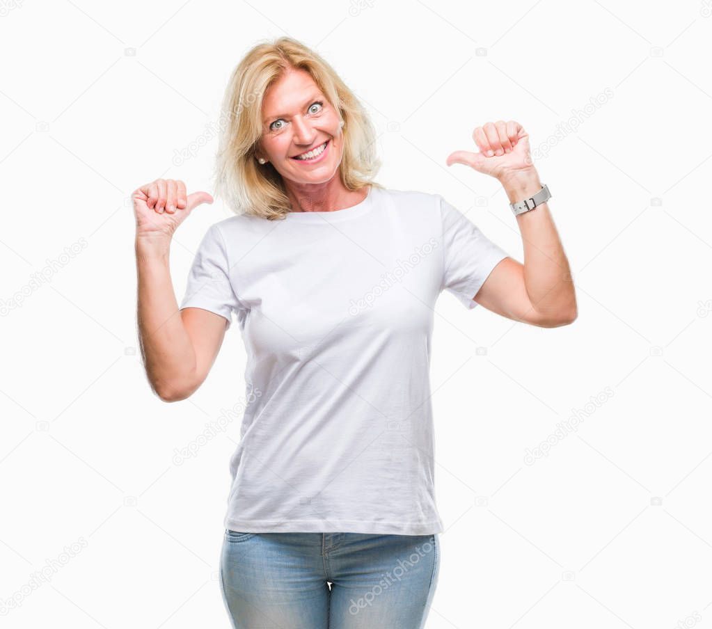 Middle age blonde woman over isolated background looking confident with smile on face, pointing oneself with fingers proud and happy.