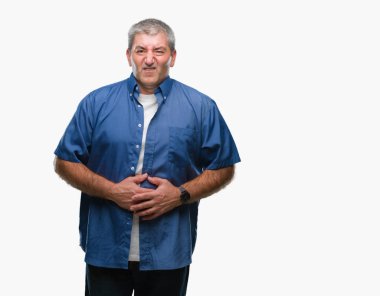 Yakışıklı üst düzey adam izole mide üzerinde el ile arka plan çünkü hazımsızlık, ağrılı hastalık hasta hissediyor. Ağrısı kavramı.