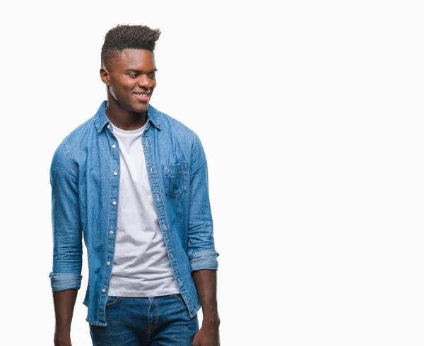 Hombre Afroamericano Joven Sobre Fondo Aislado Mirando Hacia Otro Lado — Foto de Stock