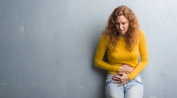 Young Redhead Woman Grey Grunge Wall Hand Stomach Because Nausea — Stock Photo, Image