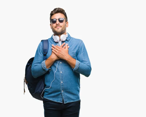 Young Handsome Tourist Man Wearing Headphones Backpack Isolated Background Smiling — Stock Photo, Image