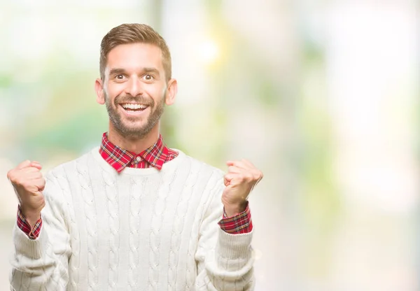 Ein Junger Gutaussehender Mann Winterpullover Vor Isoliertem Hintergrund Feiert Überrascht — Stockfoto