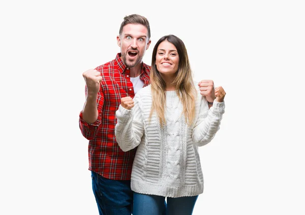 Pareja Joven Enamorada Vistiendo Suéter Invierno Sobre Fondo Aislado Celebrando —  Fotos de Stock