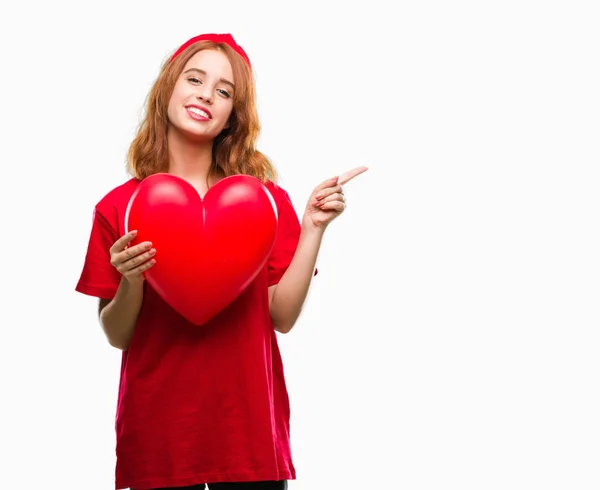 Joven Hermosa Mujer Sosteniendo Corazón Rojo Amor Sobre Fondo Aislado —  Fotos de Stock