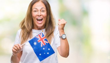 Duygu tezahürat Avustralya bayrağı gurur çığlık ve zafer ve başarı çok heyecanlı, kutluyor izole arka plan üzerinde tutan orta yaş İspanyol kadın