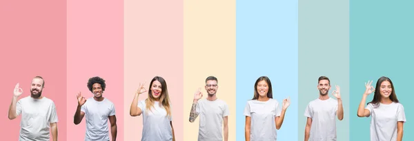 不同的种族年轻人的拼贴穿着白色 T恤在五颜六色的孤立的背景微笑正面做确定的标志用手和手指 成功的表达 — 图库照片