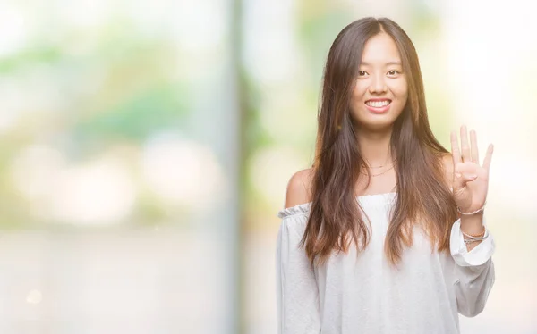 Jonge Aziatische Vrouw Geïsoleerde Achtergrond Tonen Met Vingers Nummer Vier — Stockfoto