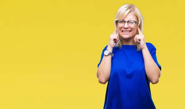 Young Beautiful Blonde Woman Wearing Glasses Isolated Background Covering Ears — Stock Photo, Image