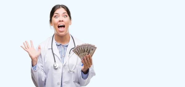 Young Hispanic Doctor Woman Holding Dollars Very Happy Excited Winner — Stock Photo, Image