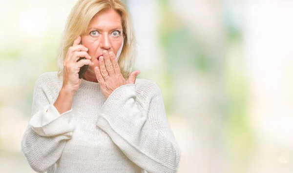 Middle Age Blonde Woman Talking Smartphone Isolated Background Cover Mouth — Stock Photo, Image