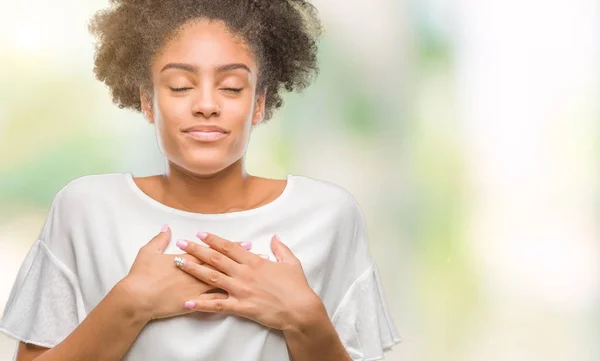 Young Afro American Woman Isolated Background Smiling Hands Chest Closed — Stock Photo, Image