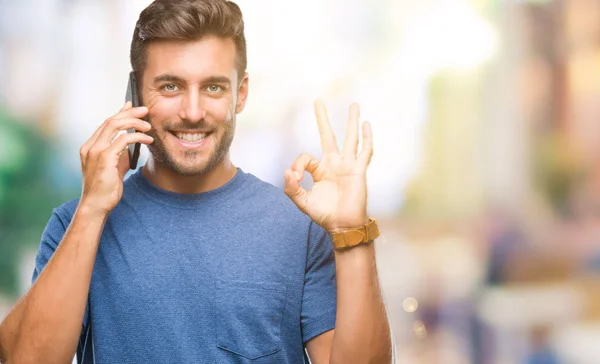 Young Handsome Man Talking Smartphone Isolated Background Doing Sign Fingers — Stock Photo, Image
