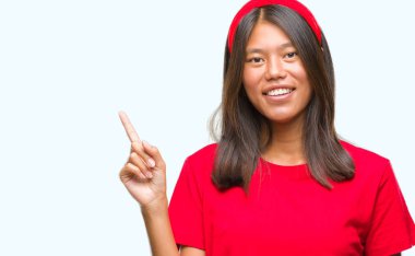 El ve parmak ile tarafına işaret eden Genç Asyalı kadın 