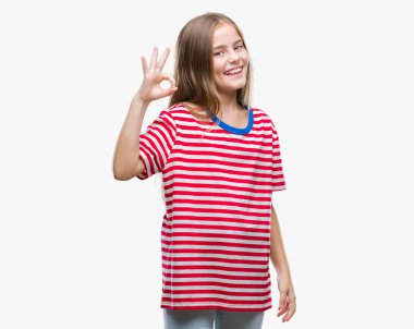 Gülümseyen izole arka plan üzerinde genç güzel kız el ve parmaklar ok işaretiyle yapıyor olumlu. Başarılı ifade.