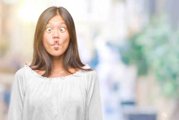 Junge Asiatische Frau Mit Isoliertem Hintergrund Macht Fischgesicht Mit Lippen — Stockfoto