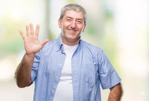 Hombre Mayor Guapo Sobre Fondo Aislado Mostrando Señalando Con Los —  Fotos de Stock