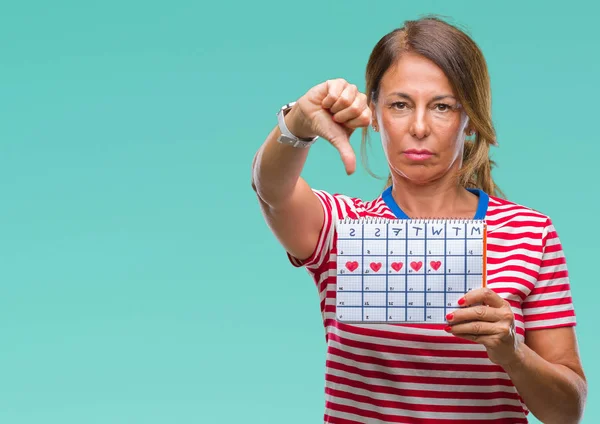 Middelbare Leeftijd Senior Spaanse Vrouw Houdt Van Menstruatie Kalender Geïsoleerde — Stockfoto