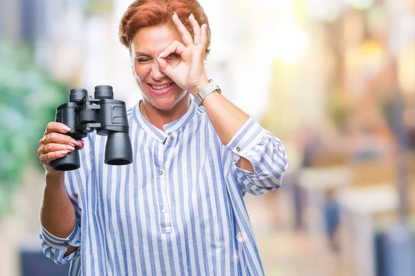 Senior Caucasian Woman Looking Binoculars Isolated Background Happy Face Smiling — Stock Photo, Image