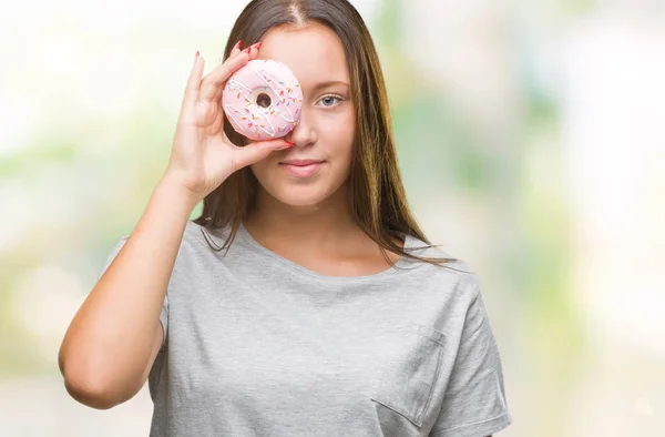 Giovane Donna Caucasica Mangiare Ciambella Dolce Sfondo Isolato Con Espressione — Foto Stock