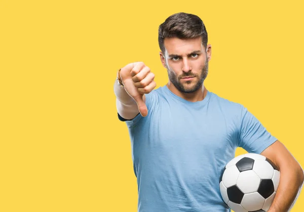 Joven Hombre Guapo Sosteniendo Pelota Fútbol Sobre Fondo Aislado Con —  Fotos de Stock